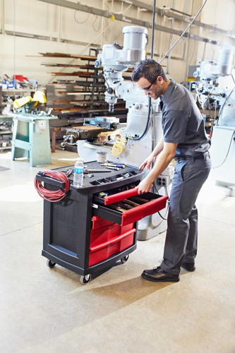 Mobile workstation featuring locking casters and adjustable handles for enhanced worker safety and ease of movement