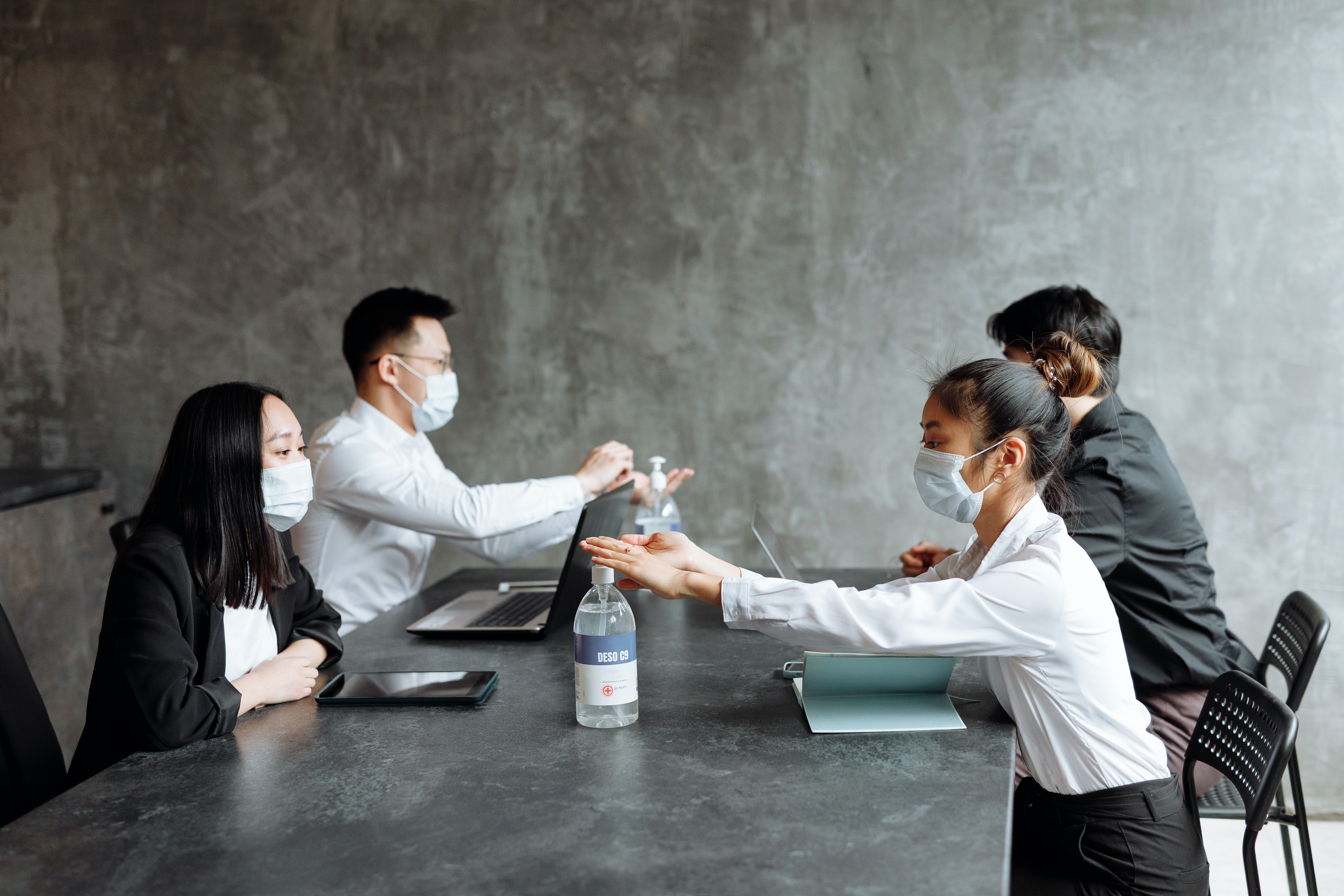 Young Business People Wearing Face Masks