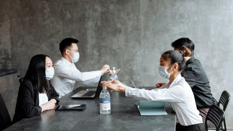 Young Business People Wearing Face Masks