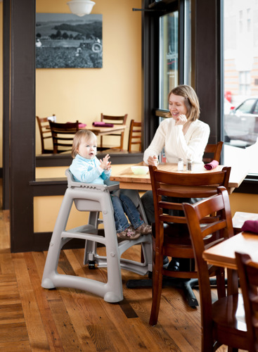 A mum with a baby in high chair